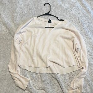 A fun, beach’s, off-white color shirt very light material